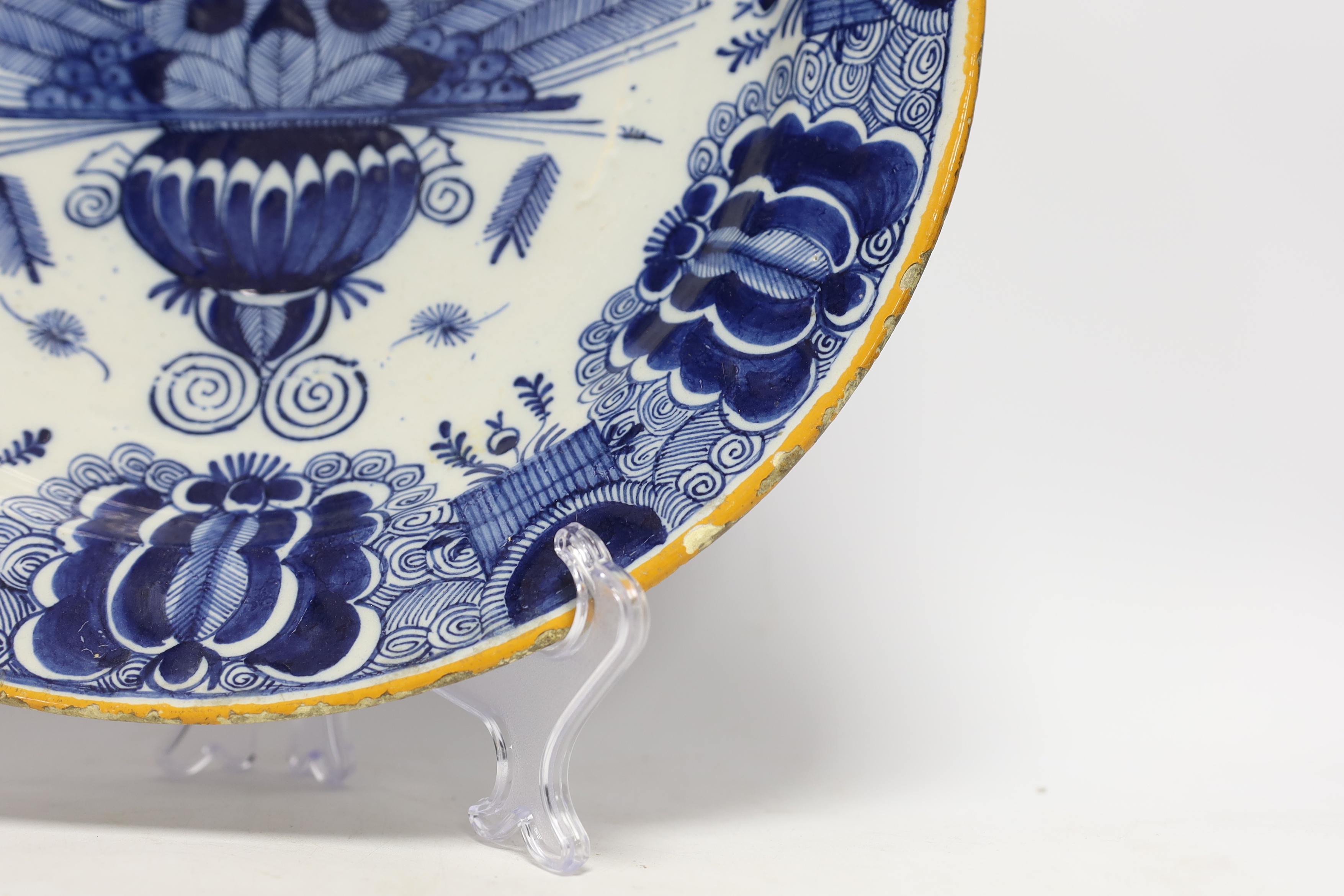 A late 18th century Delft blue and white ‘peacock’ dish, 36cm diameter